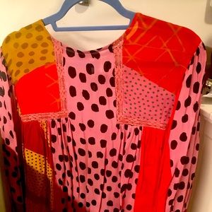 Modern, classy blouse, purchased from Anthropology.  Great dress up with jeans